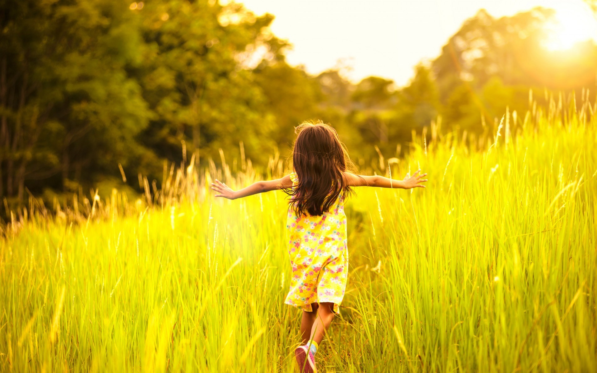 Home Page Image Whole, Child, LA, foundation, wcla, main image, main, image, girl, running, though, field